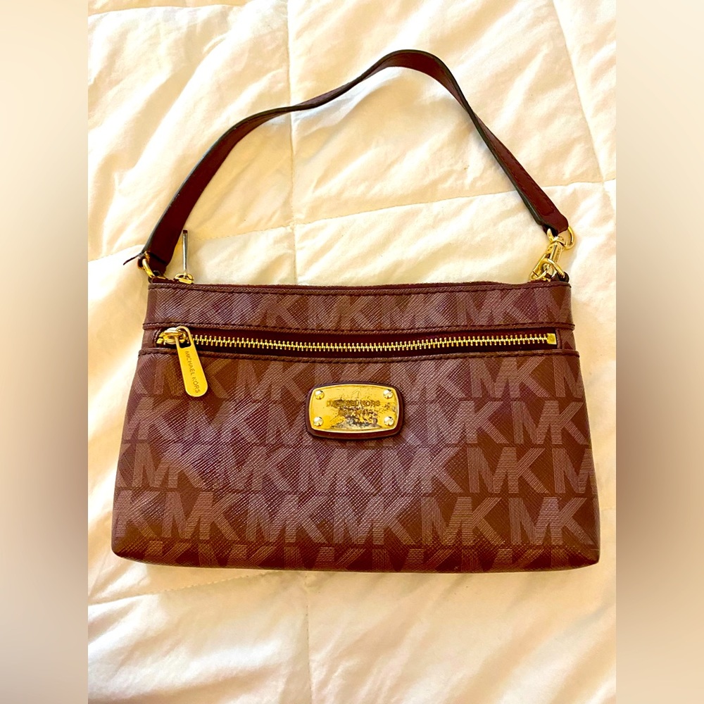 Micheal Kors burgundy wristlet